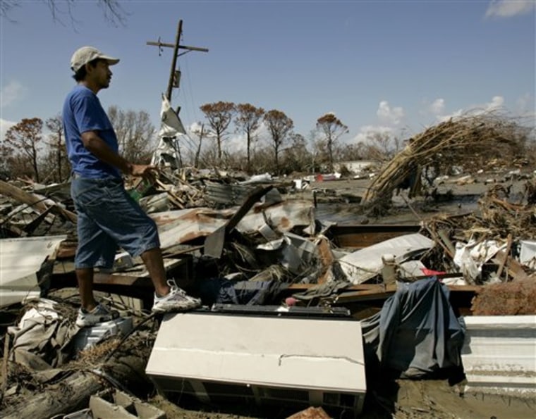 Miguel Del-Rosal surveys the remains of his home in Cameron, La., on Oct. 2, 2005. Little was spared in the town located near Hurricane Rita's landfall. 